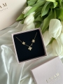 Naszyjnik ze złotym kwiatem LILY CRYSTALS srebro pozłacane